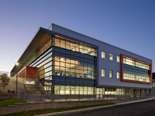 Swiss heating component manufacturer Belimo minimizes heat gain at its 190,000-square-foot Danbury headquarters with a rooftop overhang and vertical shades.